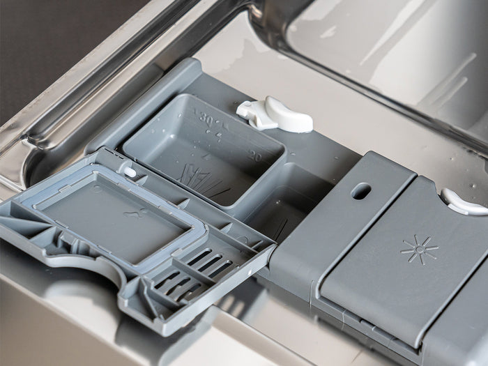 close up of washing machine detergent tray